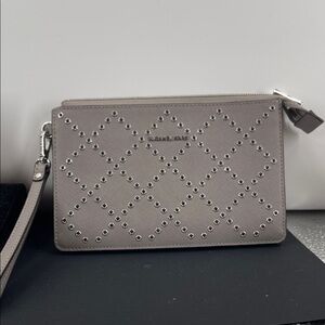 1.31.26 Michael Kors Daniela Grommeted Studded Wristlet